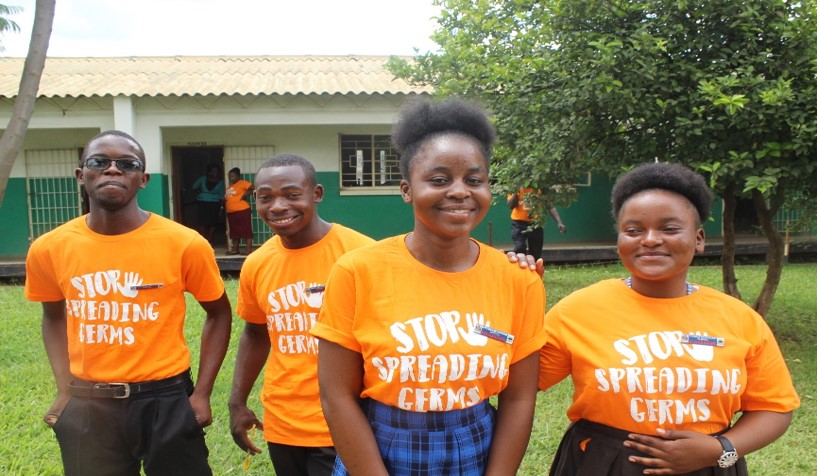 Zambian school girls carry the message of sanitation on their t-shirts