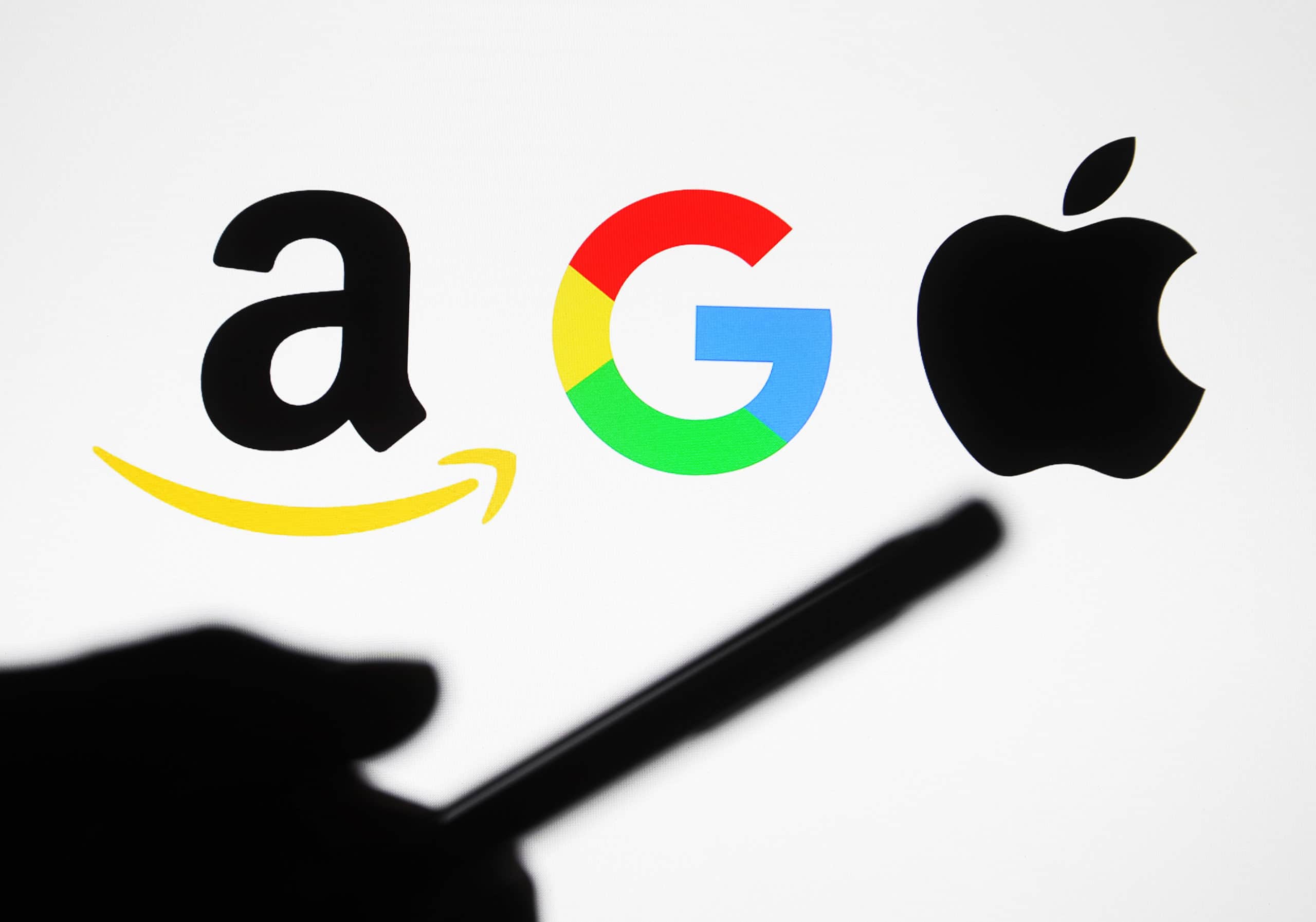 In this photo illustrative Google, Amazon and Apple logos