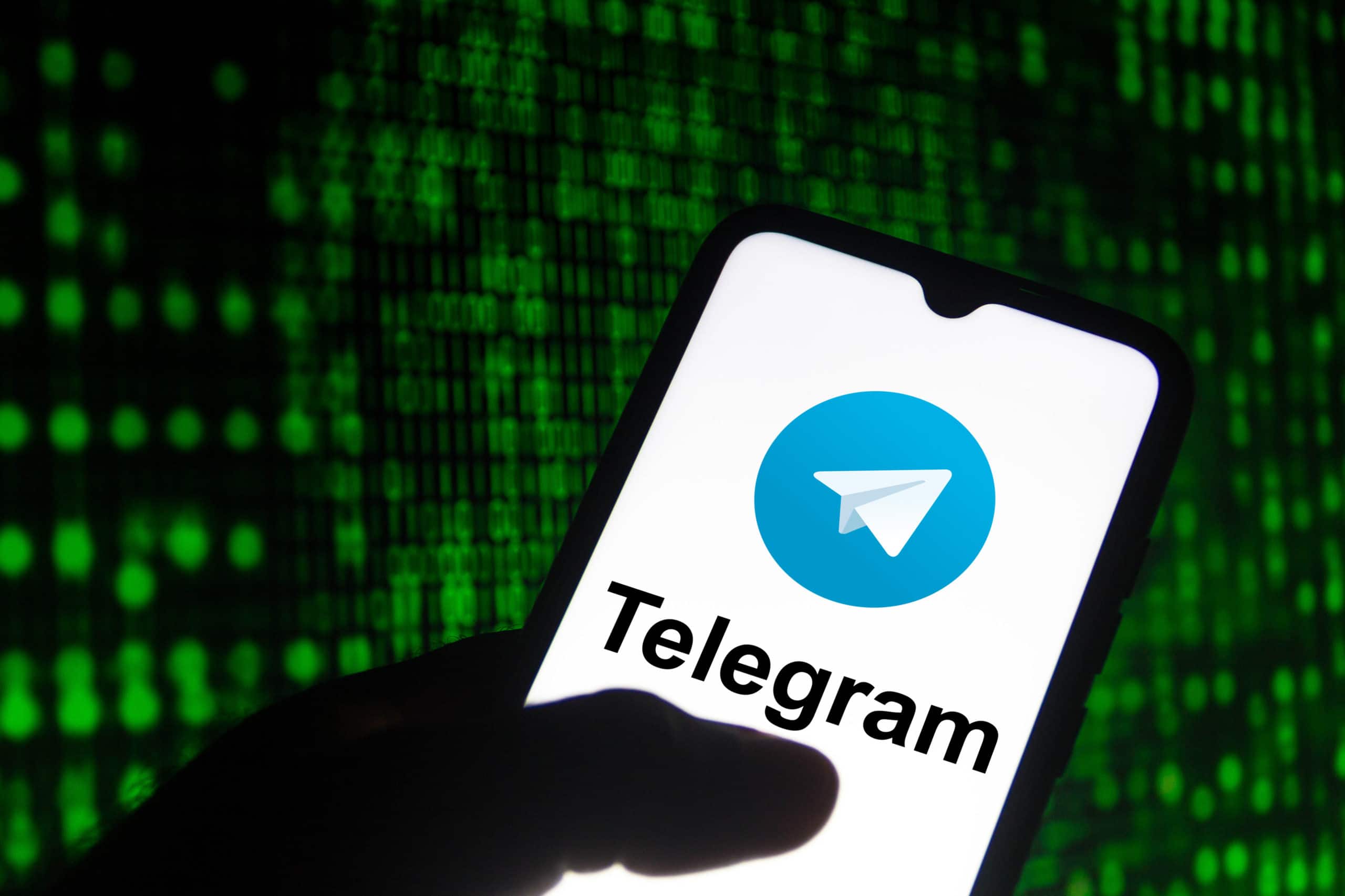 In this photo illustration the Telegram logo seen displayed
