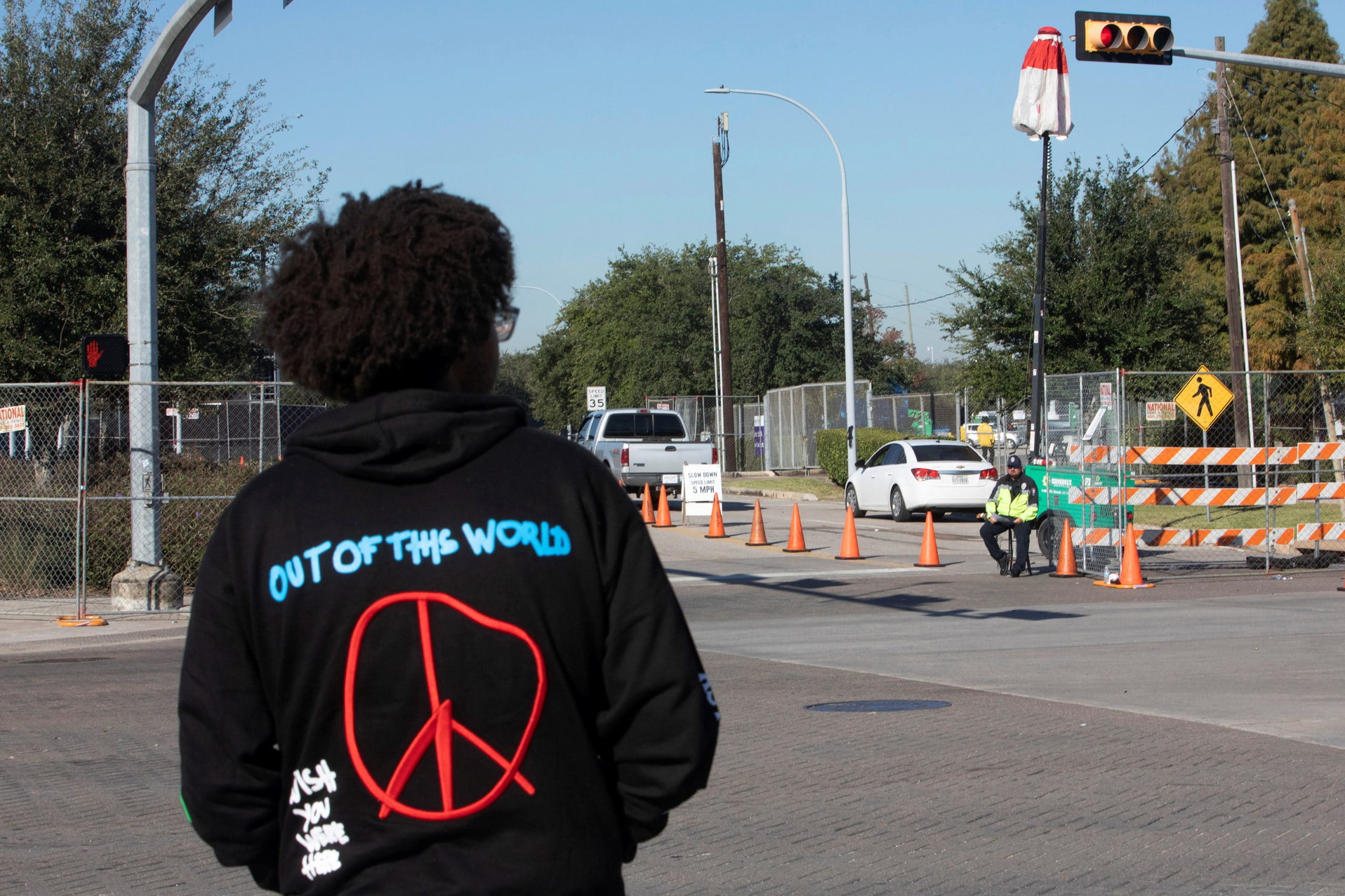 Police block an entrance to NRG Park the morning after a deadly crush of fans in Houston