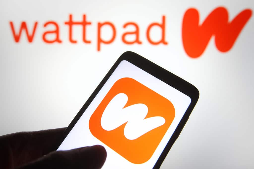In this photo illustration a Wattpad logo is seen on a