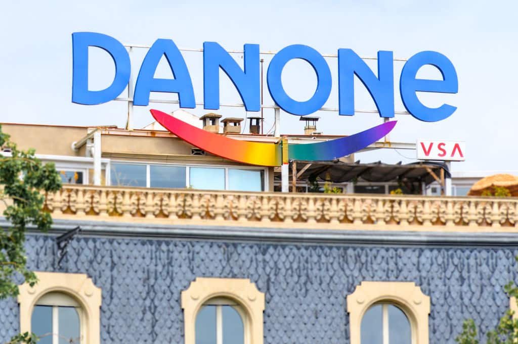 Danone logo or sign on top of an old building