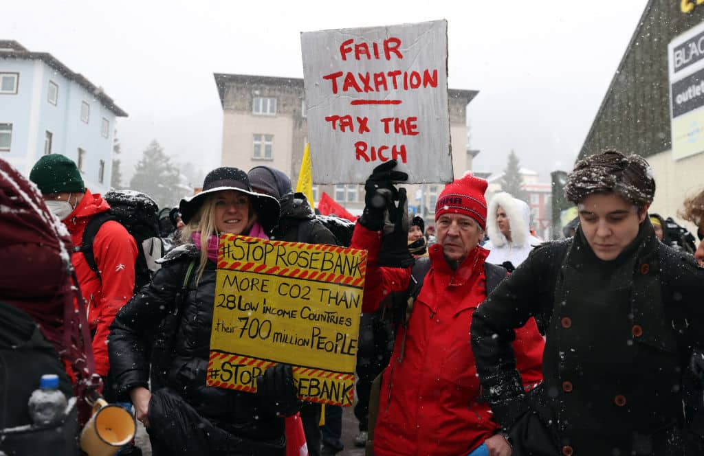 Activists in Davos stage a protest against World Economic Forum
