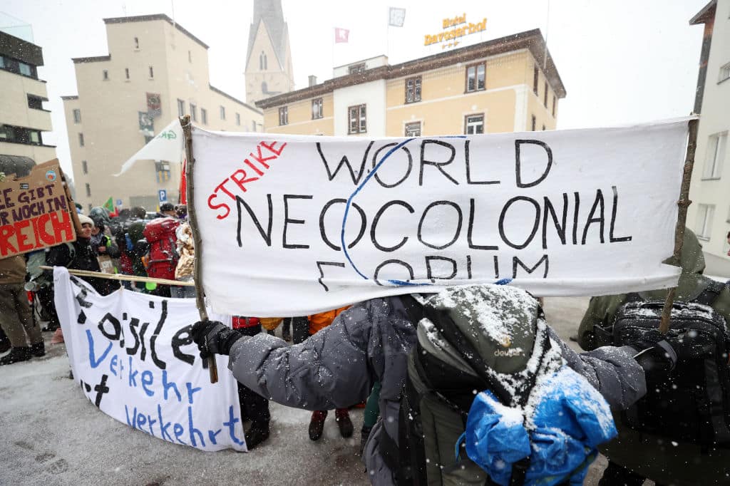 Activists in Davos stage a protest against World Economic Forum