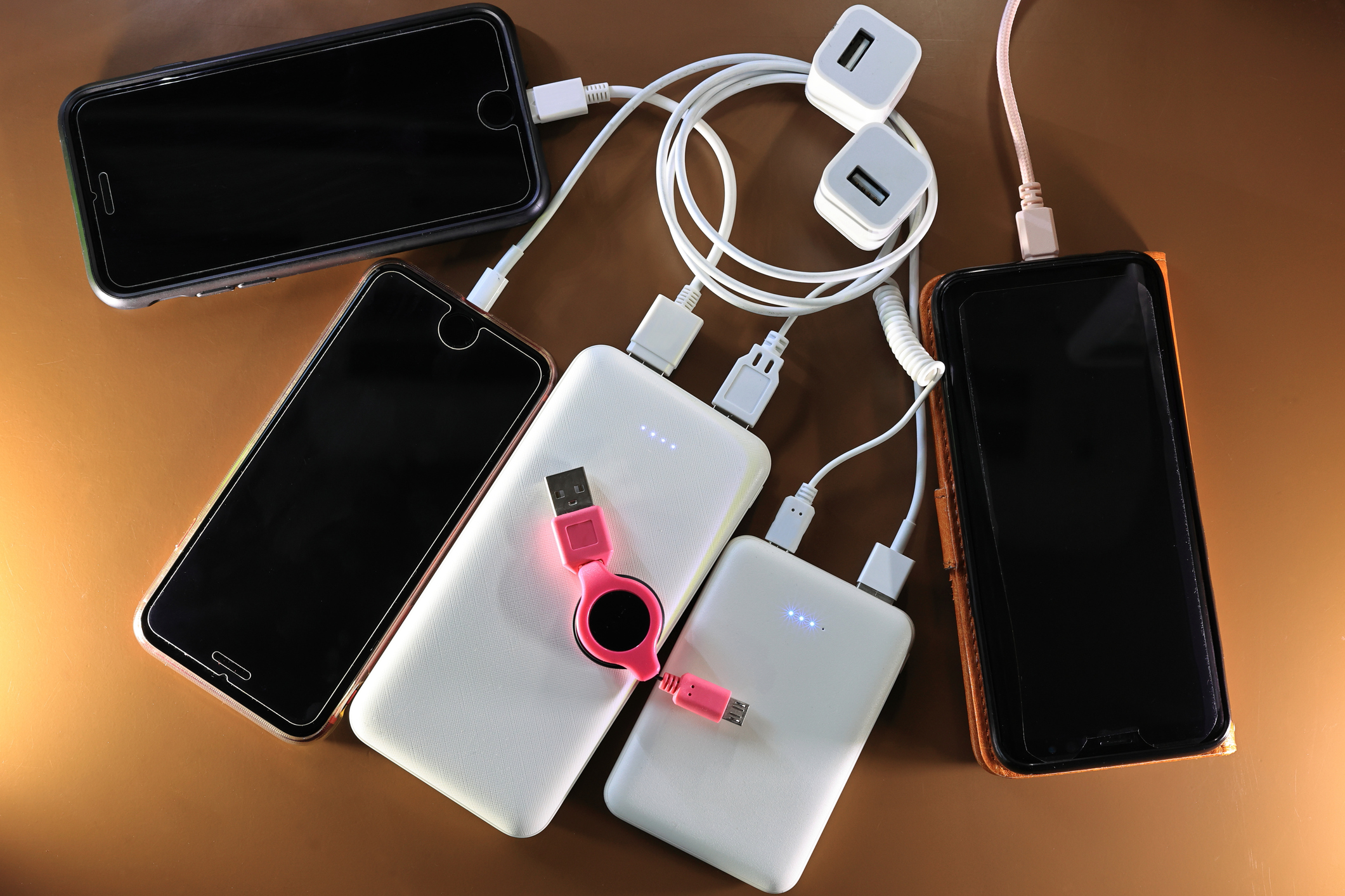 Smartphones being Charge with Portable Power Banks